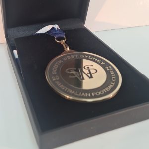 Custom gold medal for sport awards and sport trophies.